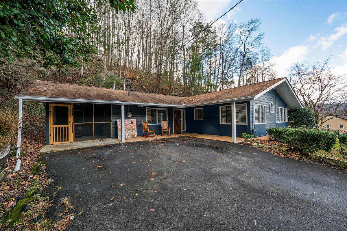 Charming cabin nestled in the mountains,  Ideal for guests seeking relaxation, nature, and a cozy retreat. Features a welcoming front porch, forest backdrop, and quiet surroundings perfect for a family escape.