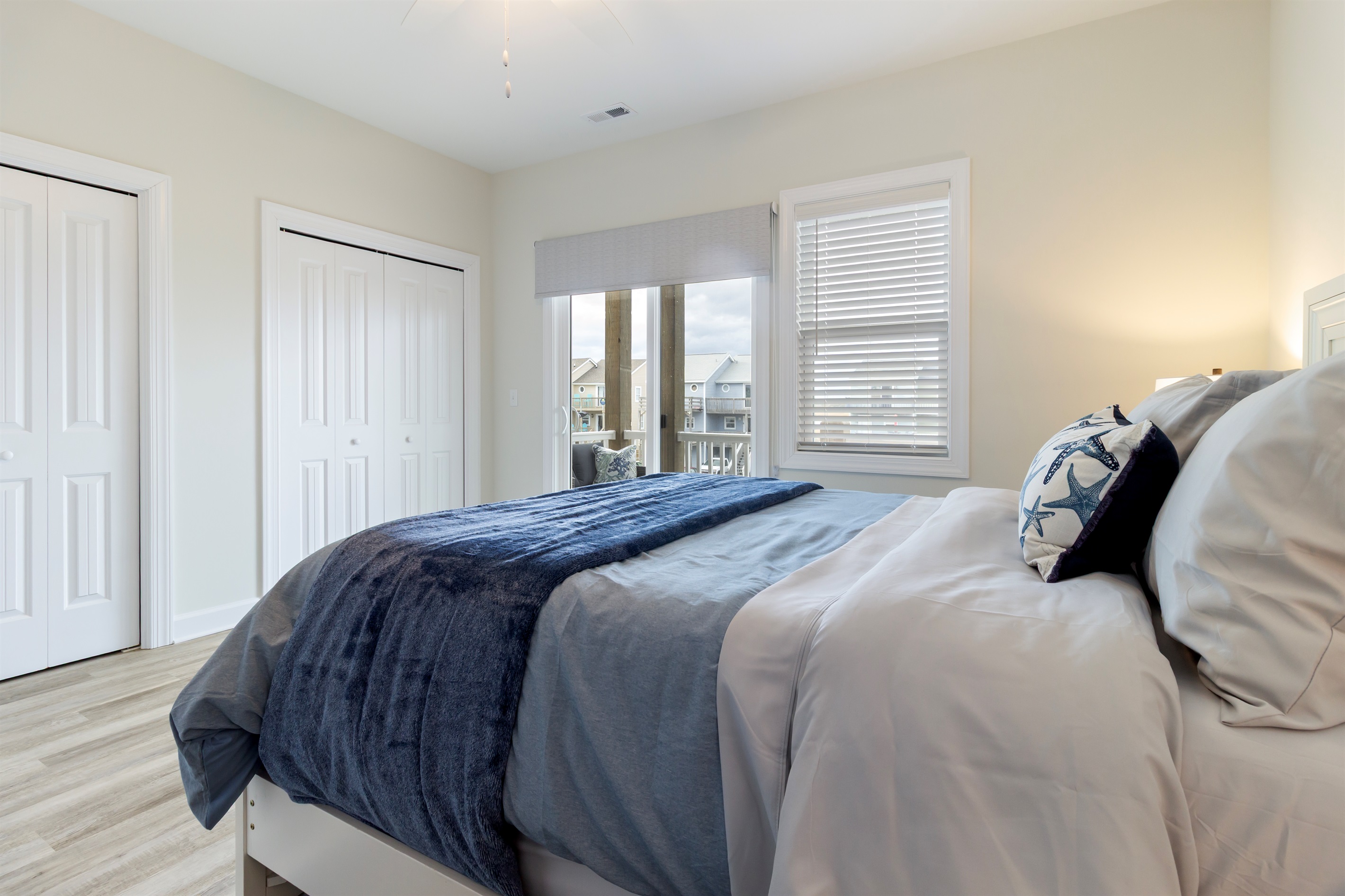 Bedroom 1 - Master with queen bed, ensuite bathroom, and private balcony