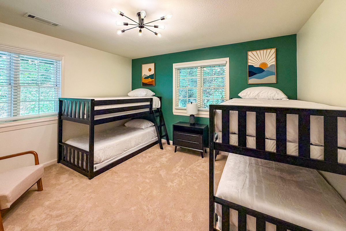 The bunk room is a fun, dedicated space for kids to enjoy. Please note that the clearance between the bunks is very low, so it is best suited for younger persons.