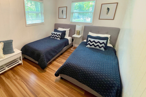 2nd Bedroom Downstairs | 2 Twin XL Beds | 50" Roku TV
