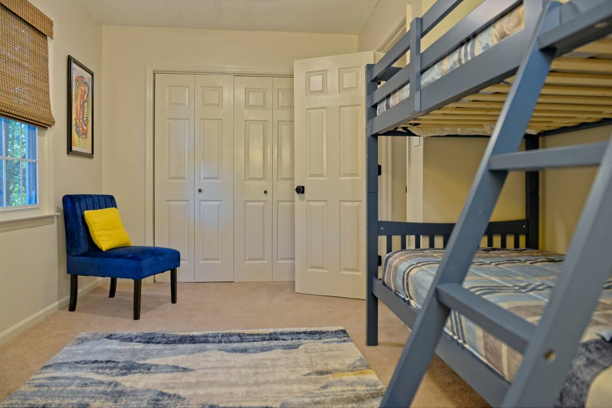 Bedroom 3- Corner chair for additional seating and plenty of closet space if needed! Located on the 2nd floor.