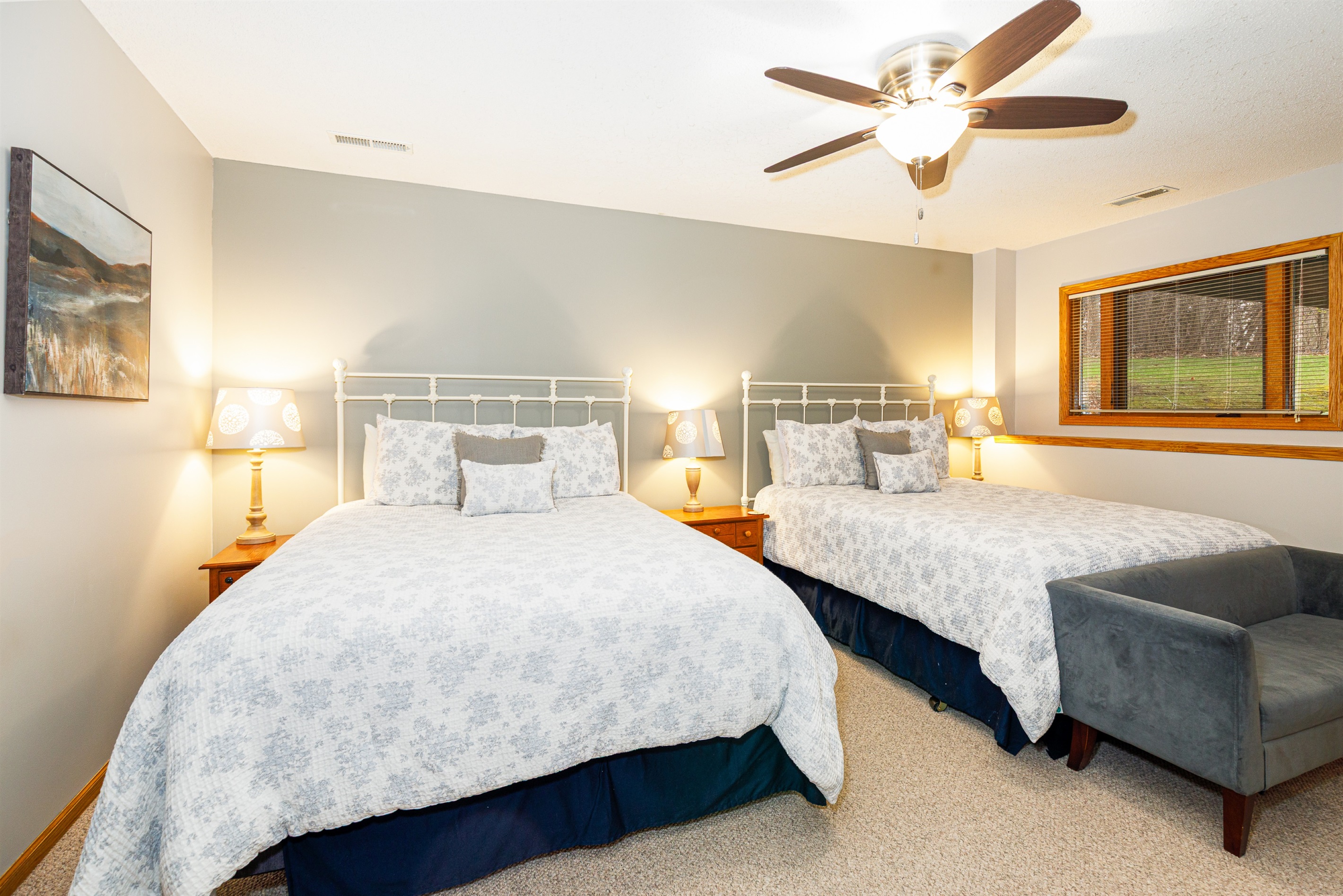 Bedroom #3 features two queen beds and an ensuite bathroom