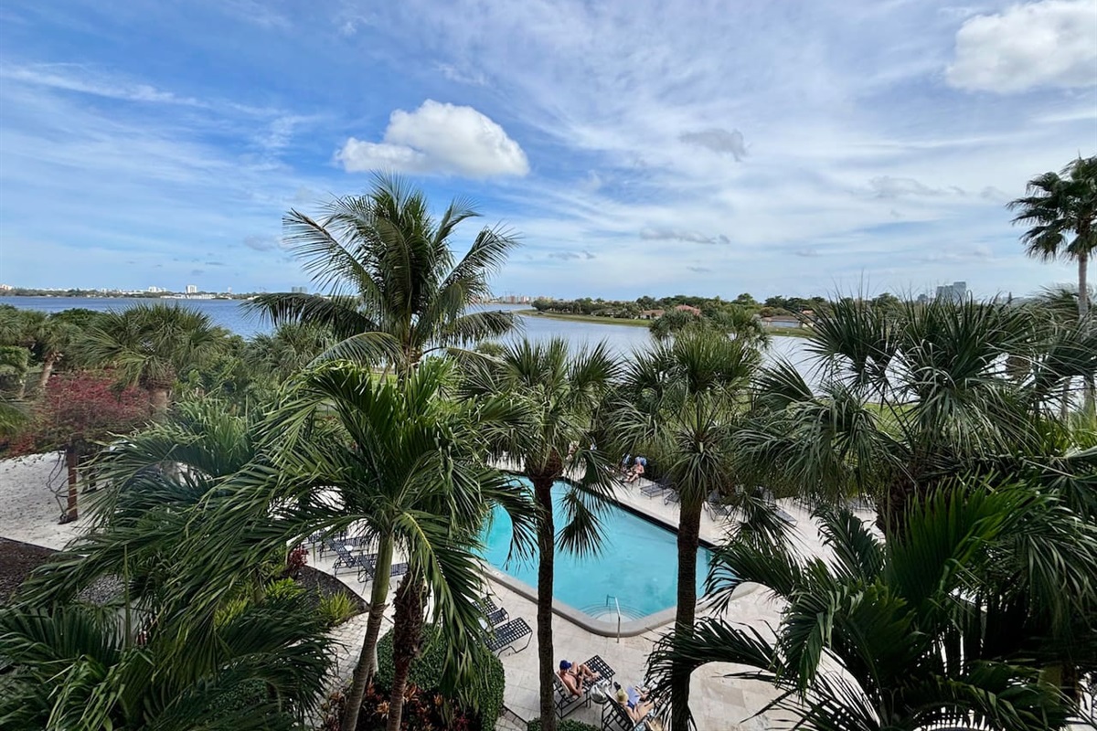 A serene, peaceful view of the pool and lake awaits you.