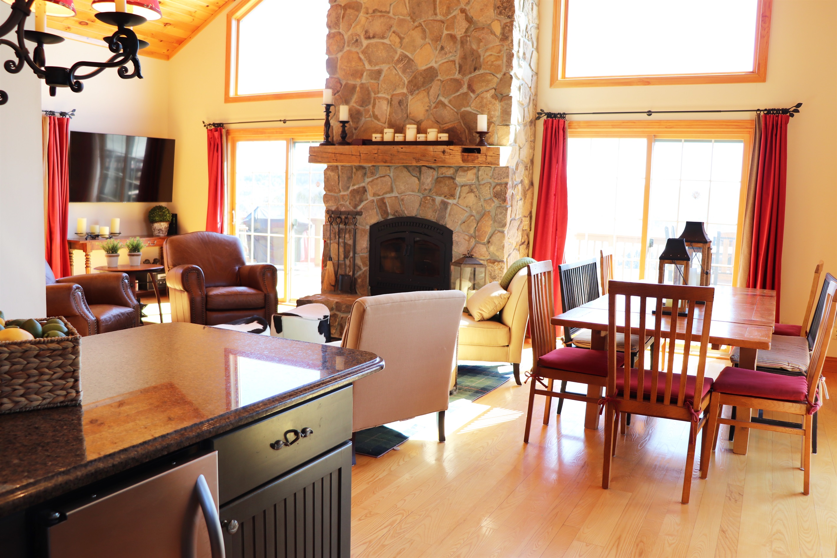 View from the kitchen into open living and dining areas.