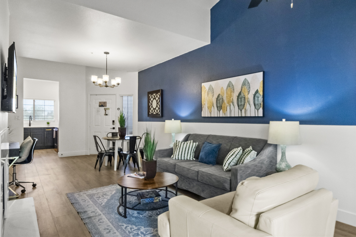 Open living and dining layout with 4 seats. 