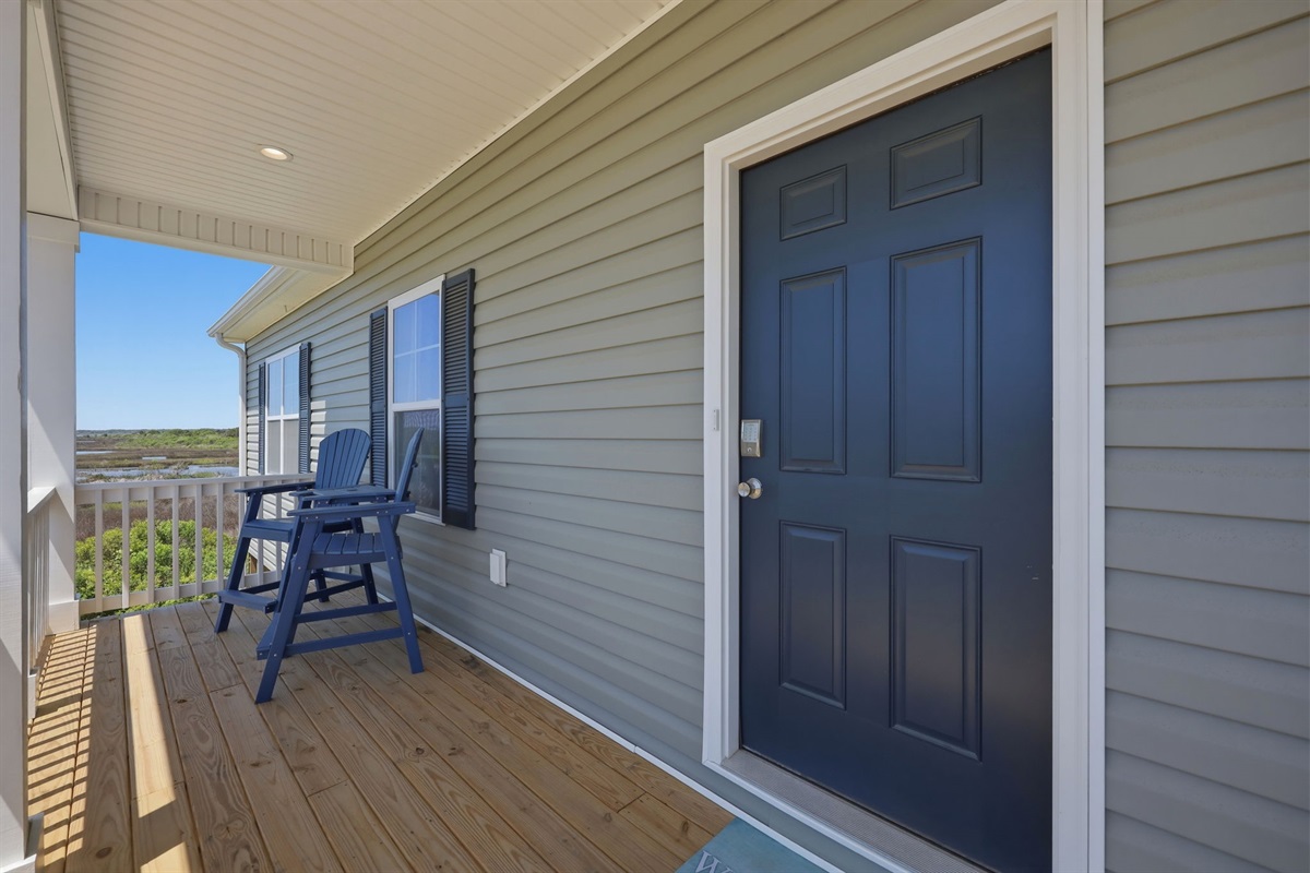 Welcoming front entry with keyless access for easy check-in and relaxing porch seating