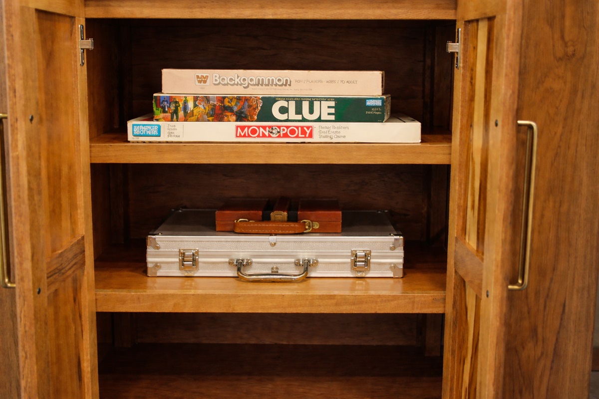 Board games in the credenza.