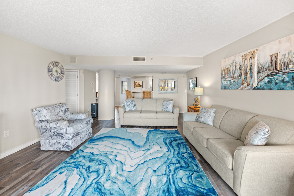 Oceanfront Living Room area with sleeper sofa, TV and balcony access