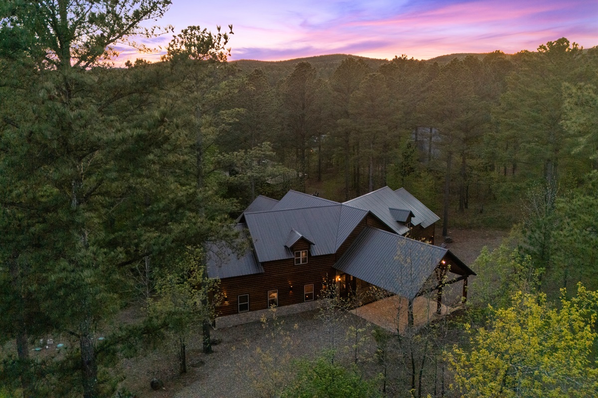 A breathtaking sunset view captures the beauty of the area, creating the perfect ending to a day spent enjoying everything this cabin has to offer.