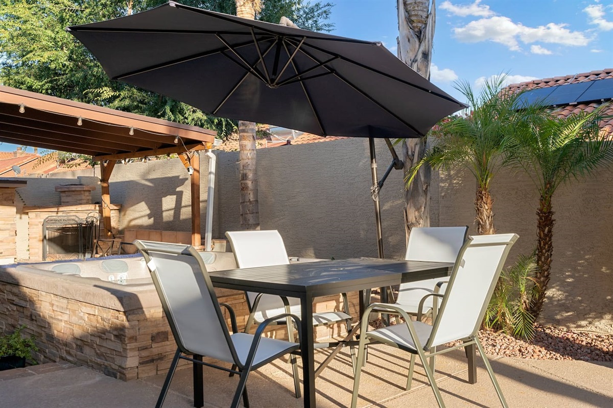 Outdoor dining table with plenty of shade.