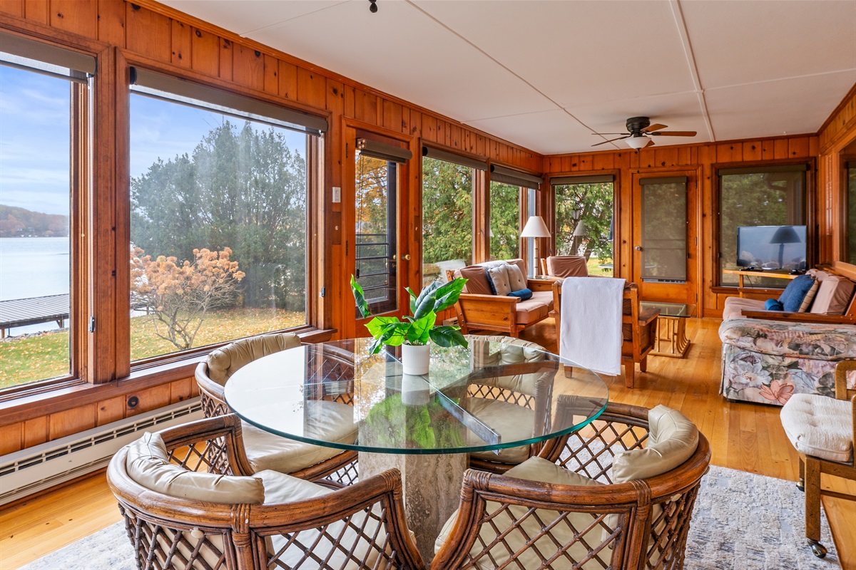 Cozy sun room for morning coffee or evening wine with beautiful views of the lake