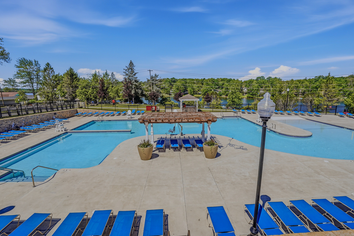  Community pool with gazebo, lap lanes, and full sun exposure