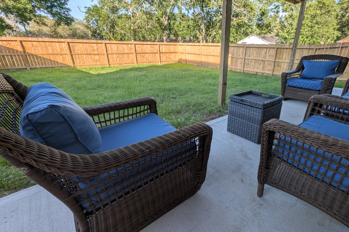 Kids and pets can play the large fenced yard. 