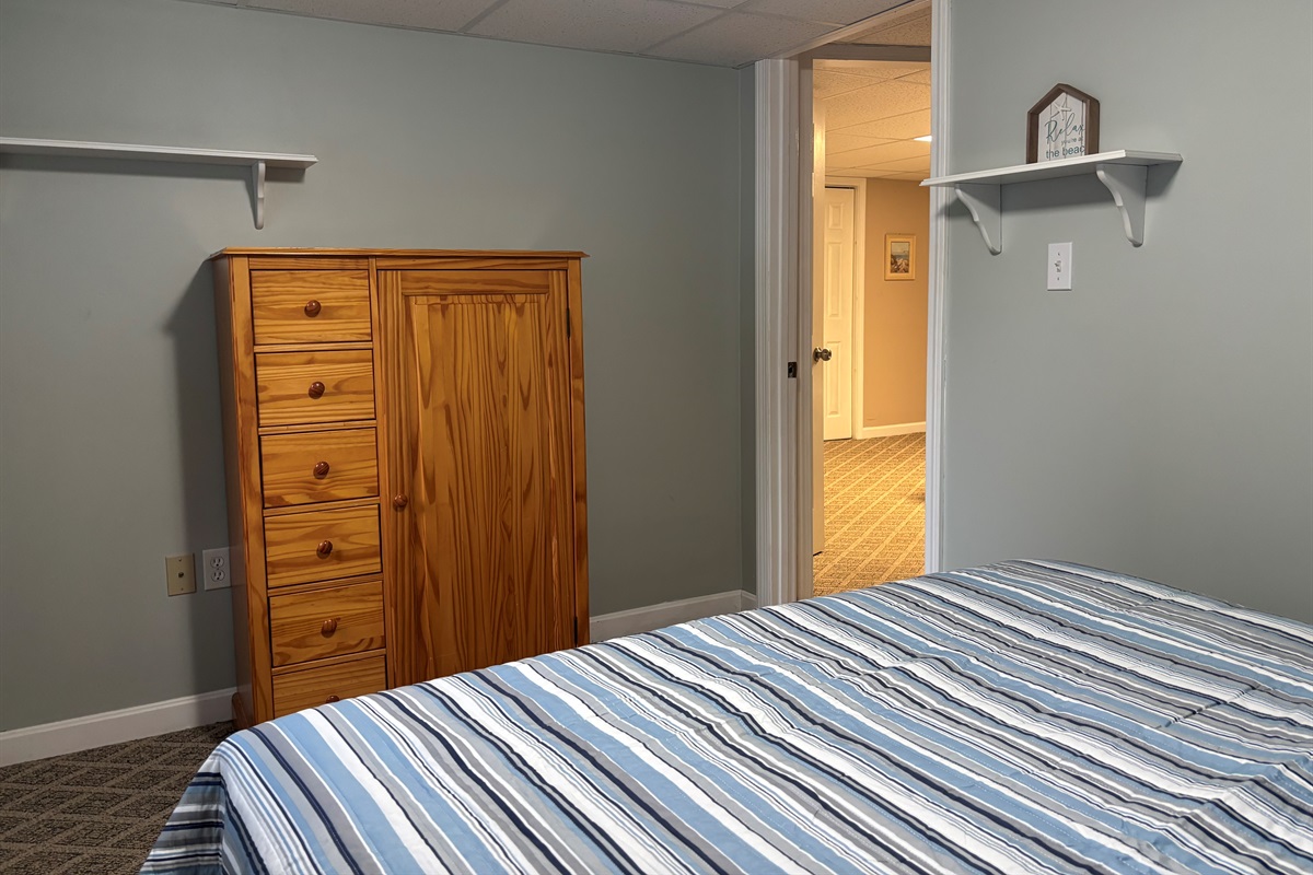 Queen bedroom in finished basement 