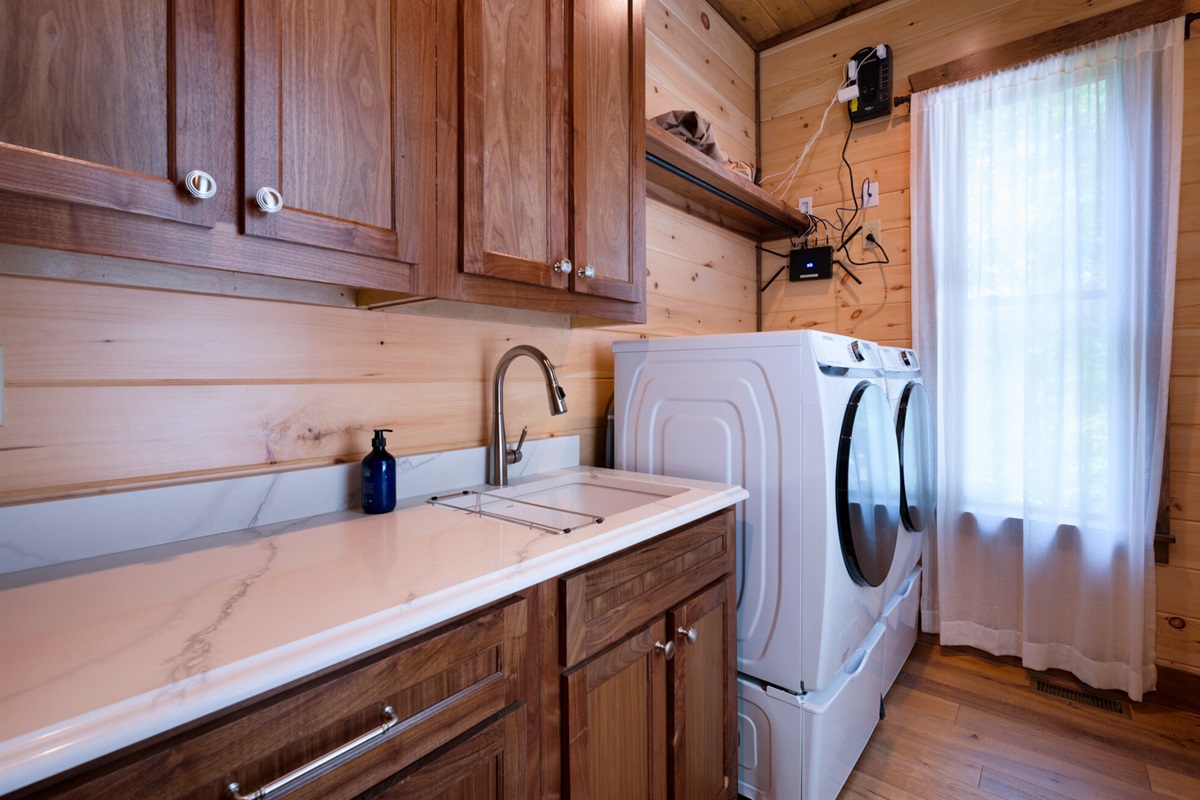A convenient laundry room with washer and dryer, making it easy to keep up with your vacation wardrobe.