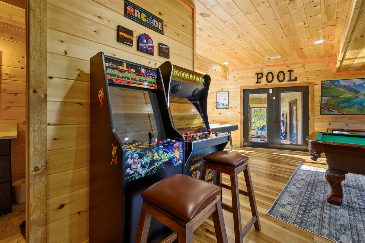 Cypress Game room multicades with view of exit to pool house