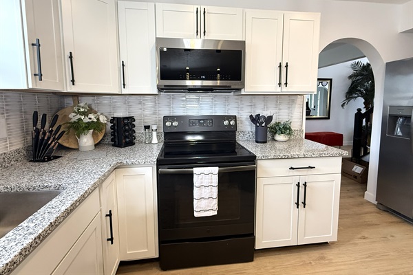 Fully equipped kitchen with modern appliances