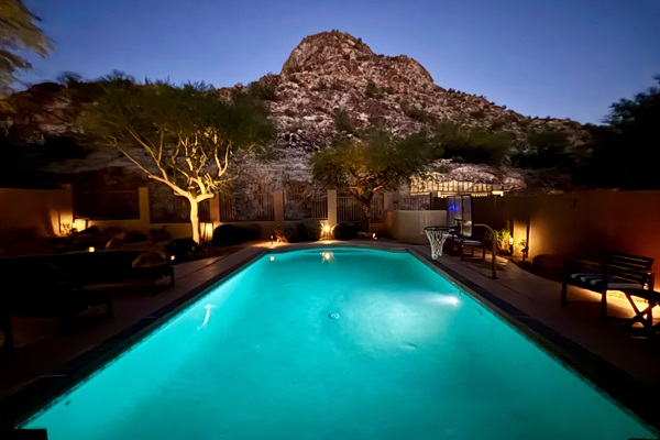Backyard mountain and pool in the evening