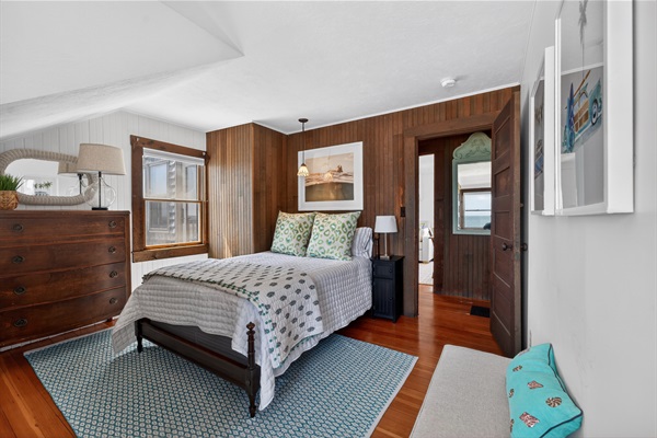 Welcome to our second bedroom! 
Relax in this charming oceanfront bedroom with a cozy full bed and water views!