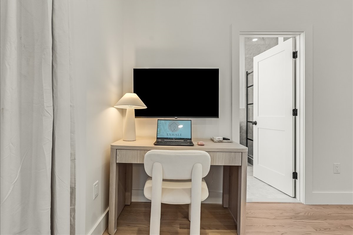 Polished desk area designed for focus and flair.