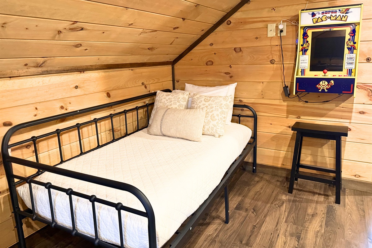 Twin bed, in the loft, providing indulging comfort - with cotton linen and plush mattress