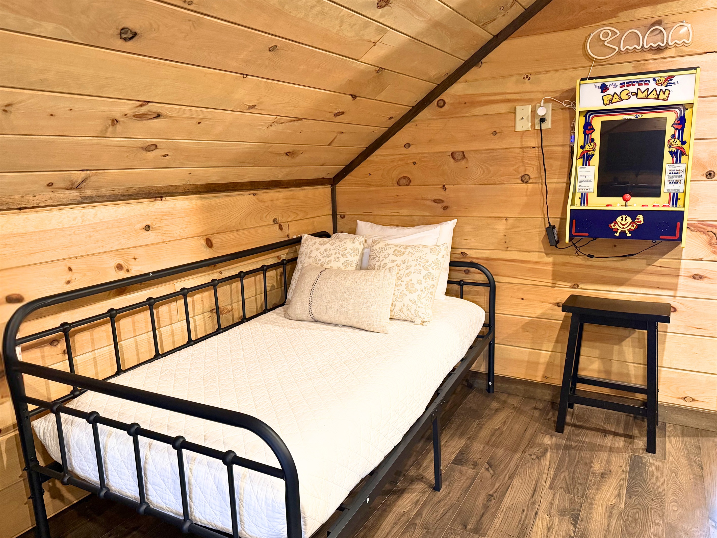 Twin bed, in the loft, providing indulging comfort - with cotton linen and plush mattress