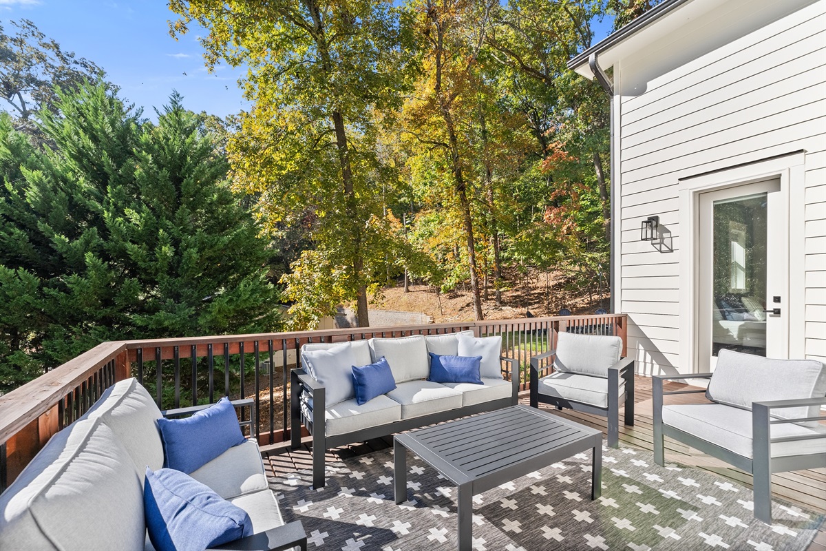 Side deck lounge with sectional seating — great for morning coffee or sunset chats.