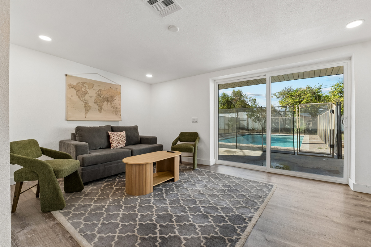 If the pool doesn't call you outside, relax inside in the family room.