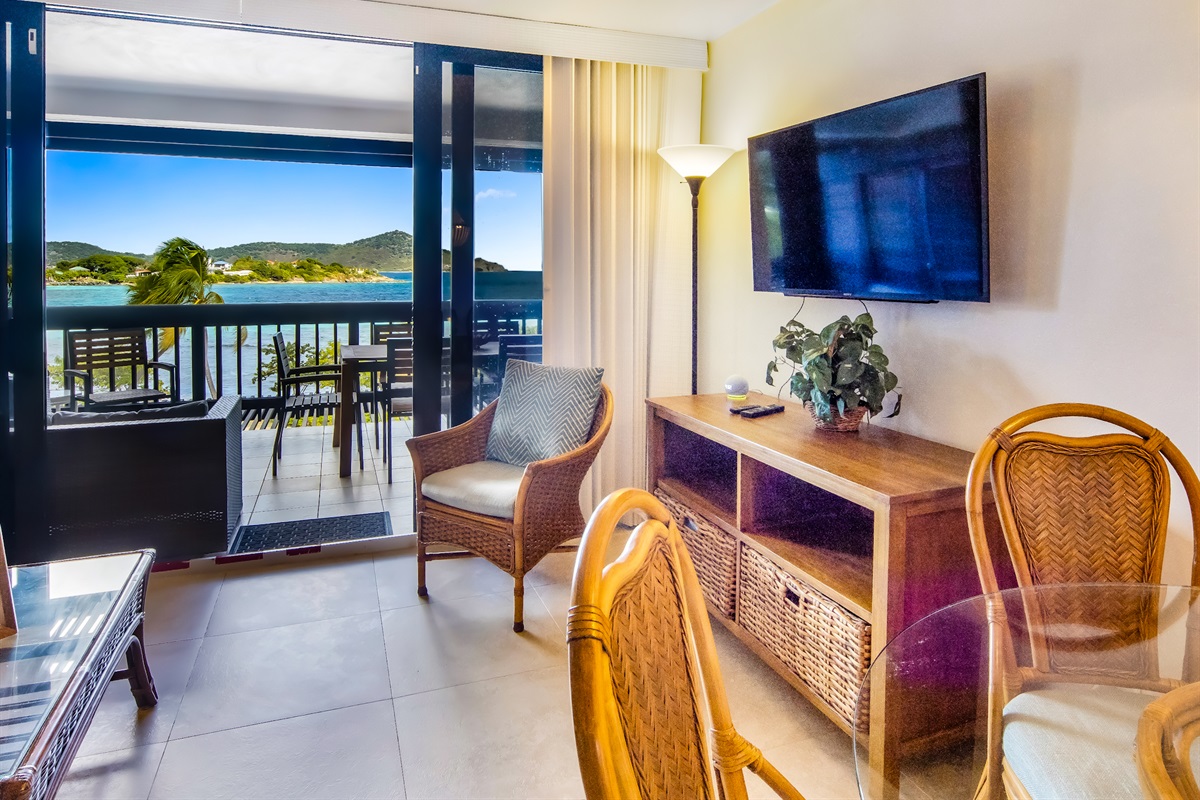 Convenient entertainment area beneath the TV, perfect for storage. 