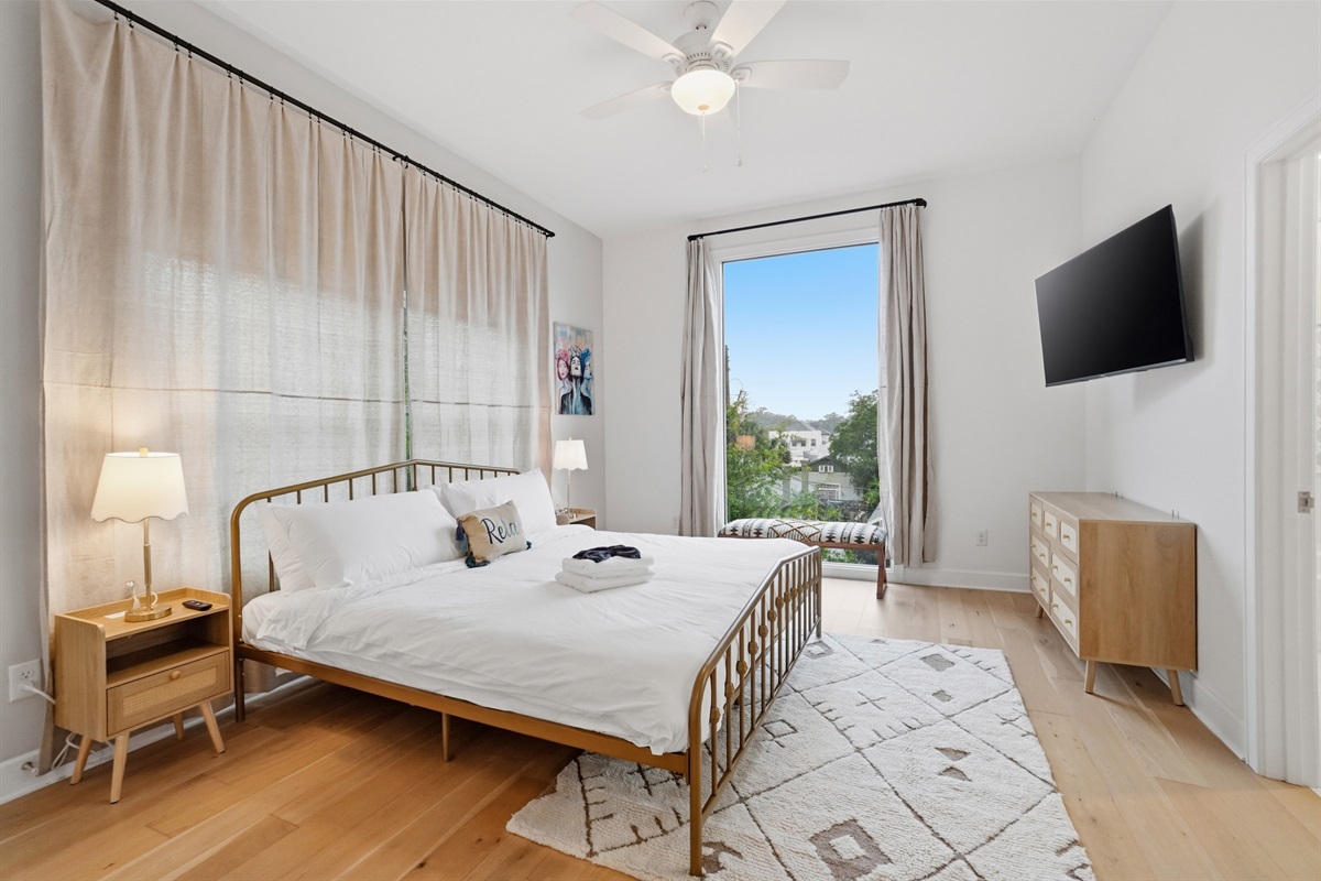 Upstairs guest bedroom with huge picture window