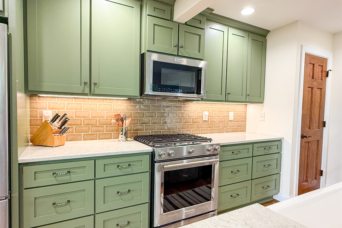 Enjoy cooking in a fully equipped kitchen featuring sleek stainless steel appliances.