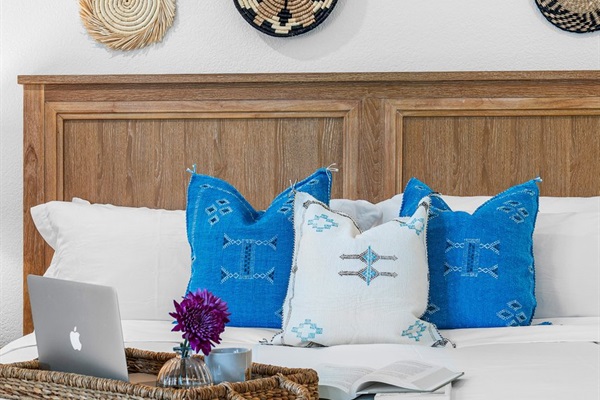 Artful textures and soft linens bring a serene, boutique-hotel feel to this beautifully styled bedroom retreat.