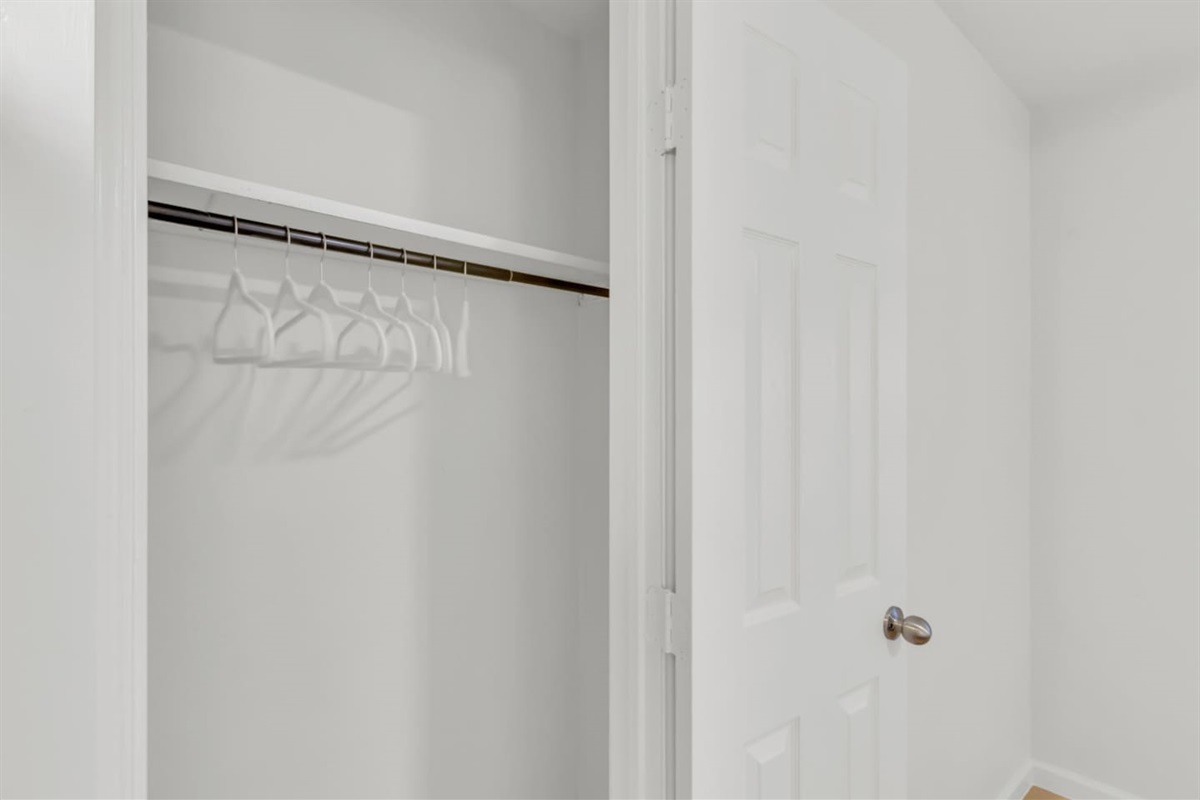 Spacious closet with plenty of hangers and clothes storage for longer visits, ensuring an organized and comfortable stay.