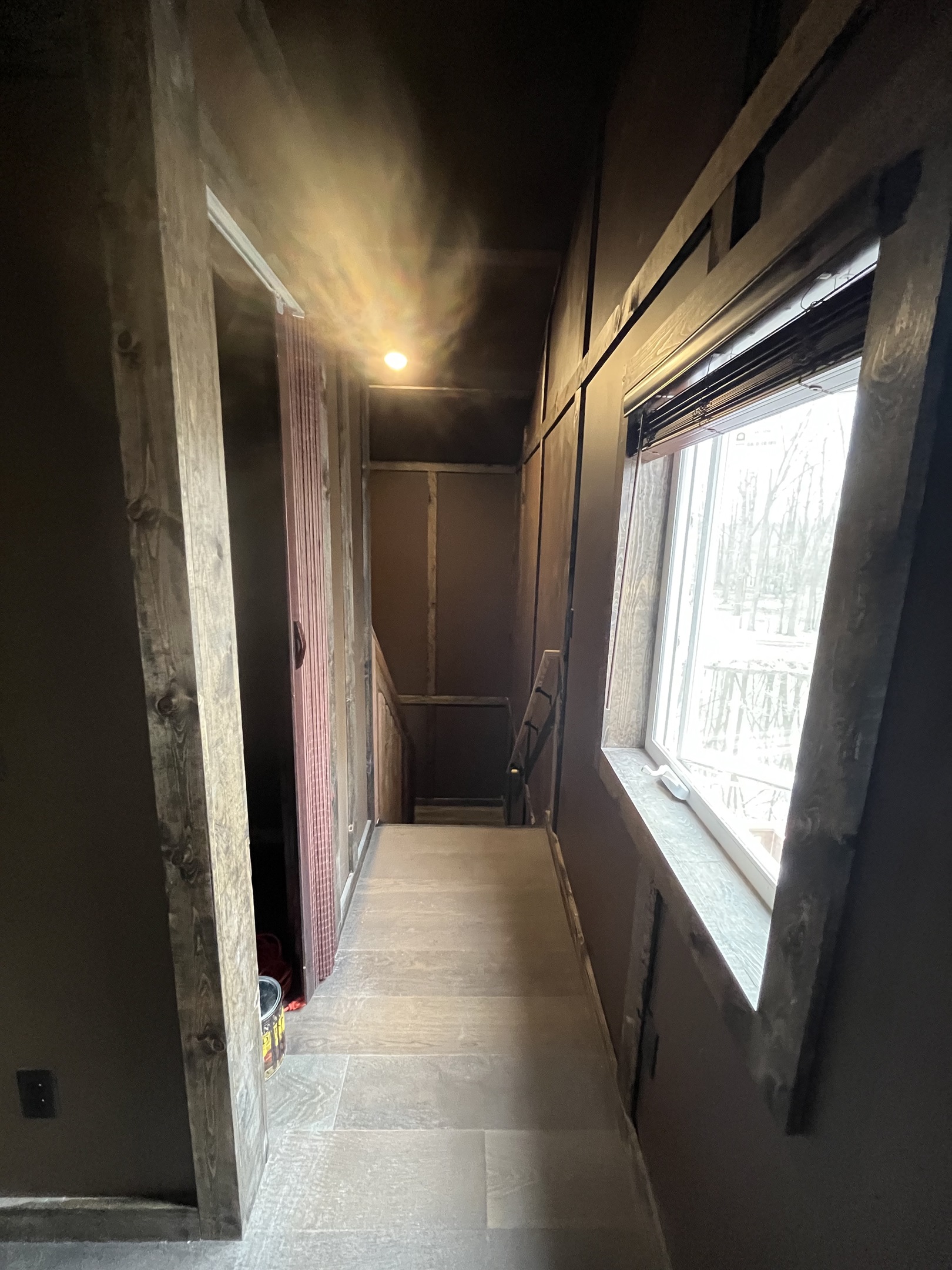 The loft floor has a back area with a nook that has a king over king bunkbed
