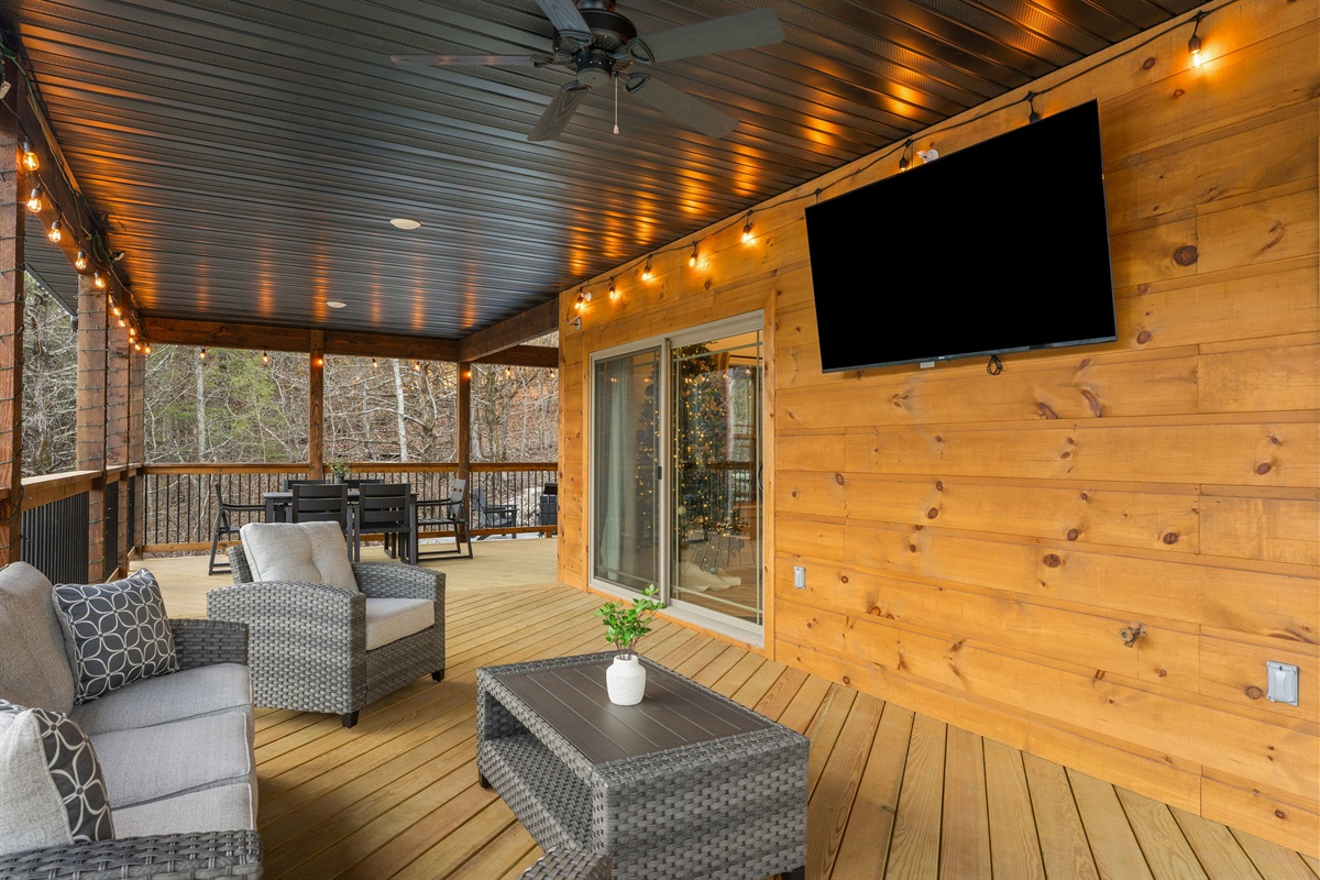 Another view of the deck seating, perfect for relaxing outside.