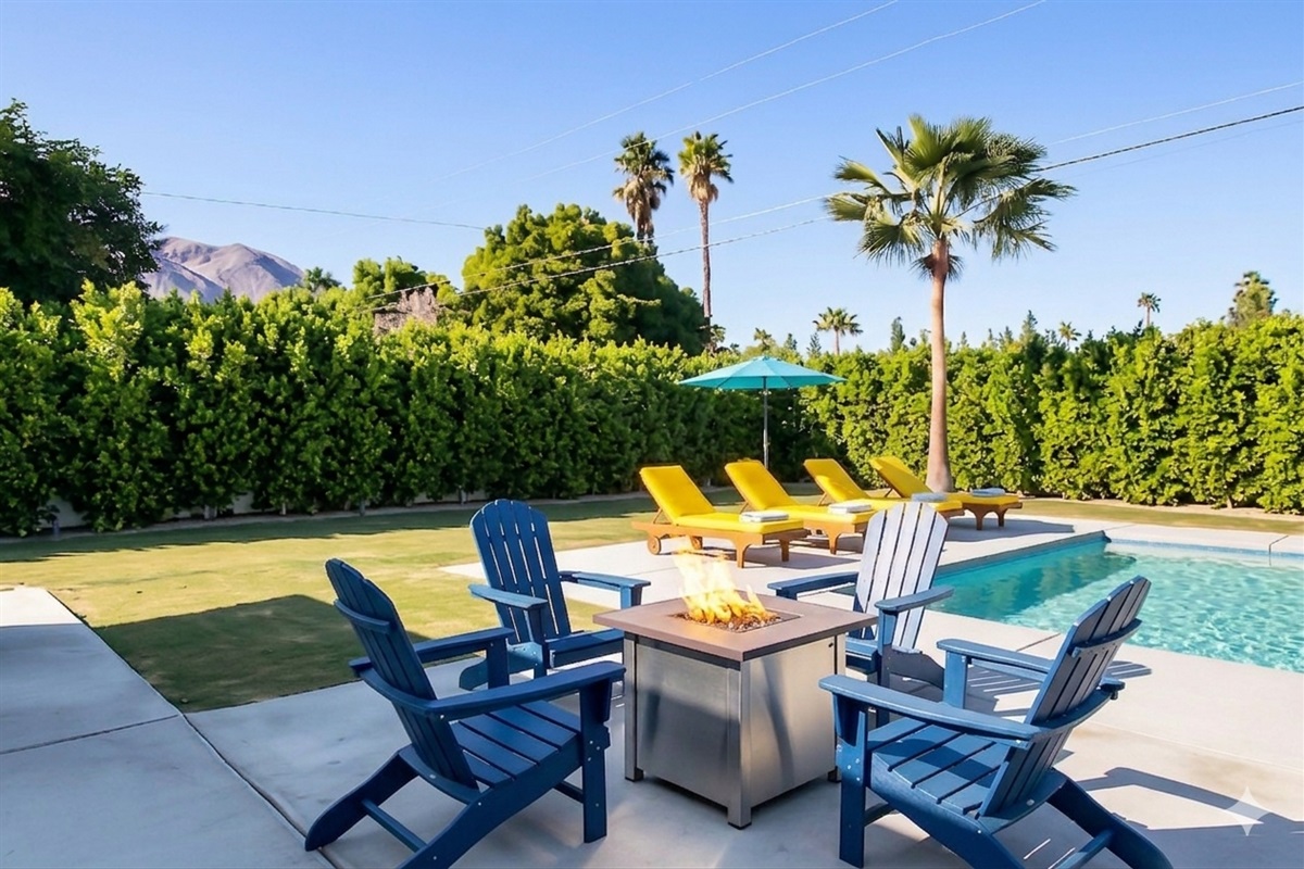Escape to your own peaceful retreat with a tranquil backyard that offers privacy and serene desert vibes. Enjoy the pool or lounge by the fire pit beneath the swaying palm trees.