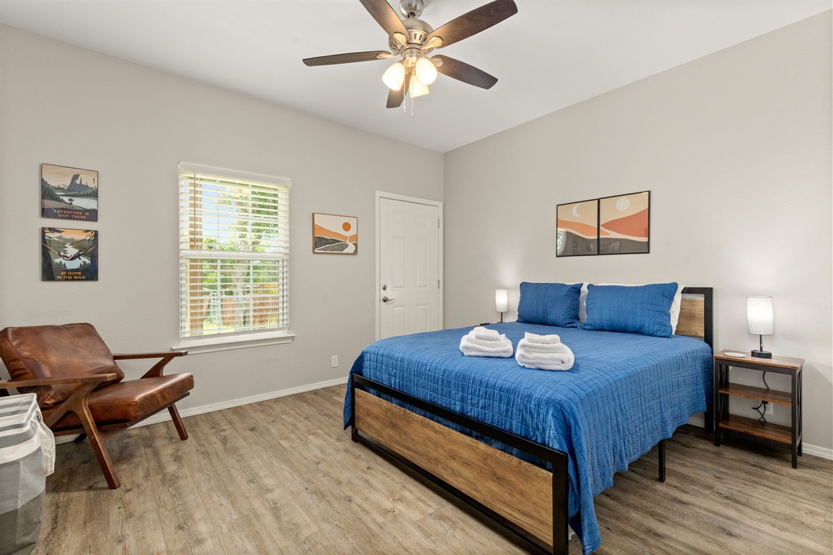 Queen bedroom with USB-ready bedside setup