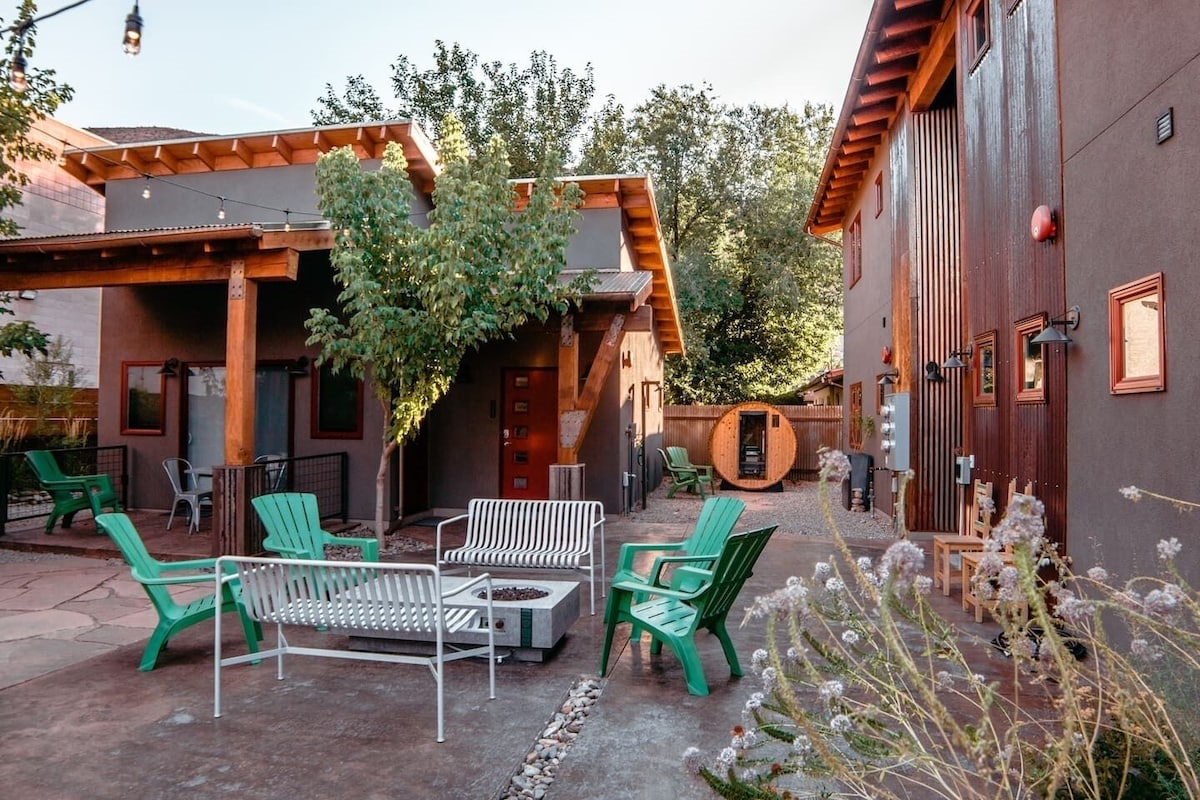 Relaxing common area with fire pit, sitting area, BBQ and sauna