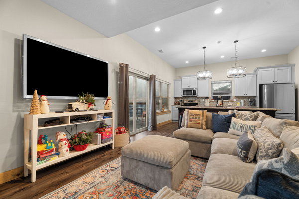 Lower level FULL kitchen. Refrigerator, dishwasher, oven/ceramic glass cooktop, microwave, drip coffee maker, Keurig, and Nespresso. Stocked with small appliances, cookware, bakeware, utensils, dishes, glassware, mugs, and more!