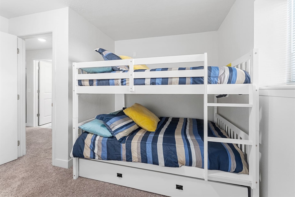 Lower level Bedroom 3. Full size bunk beds w/ trundle! 