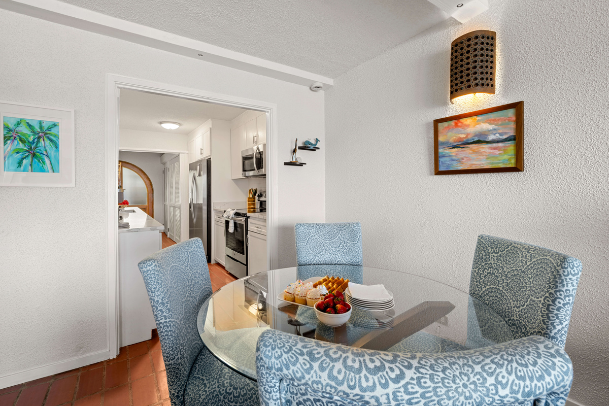 Comfortably seating four, this inviting dining space is perfect for sharing vacation memories.