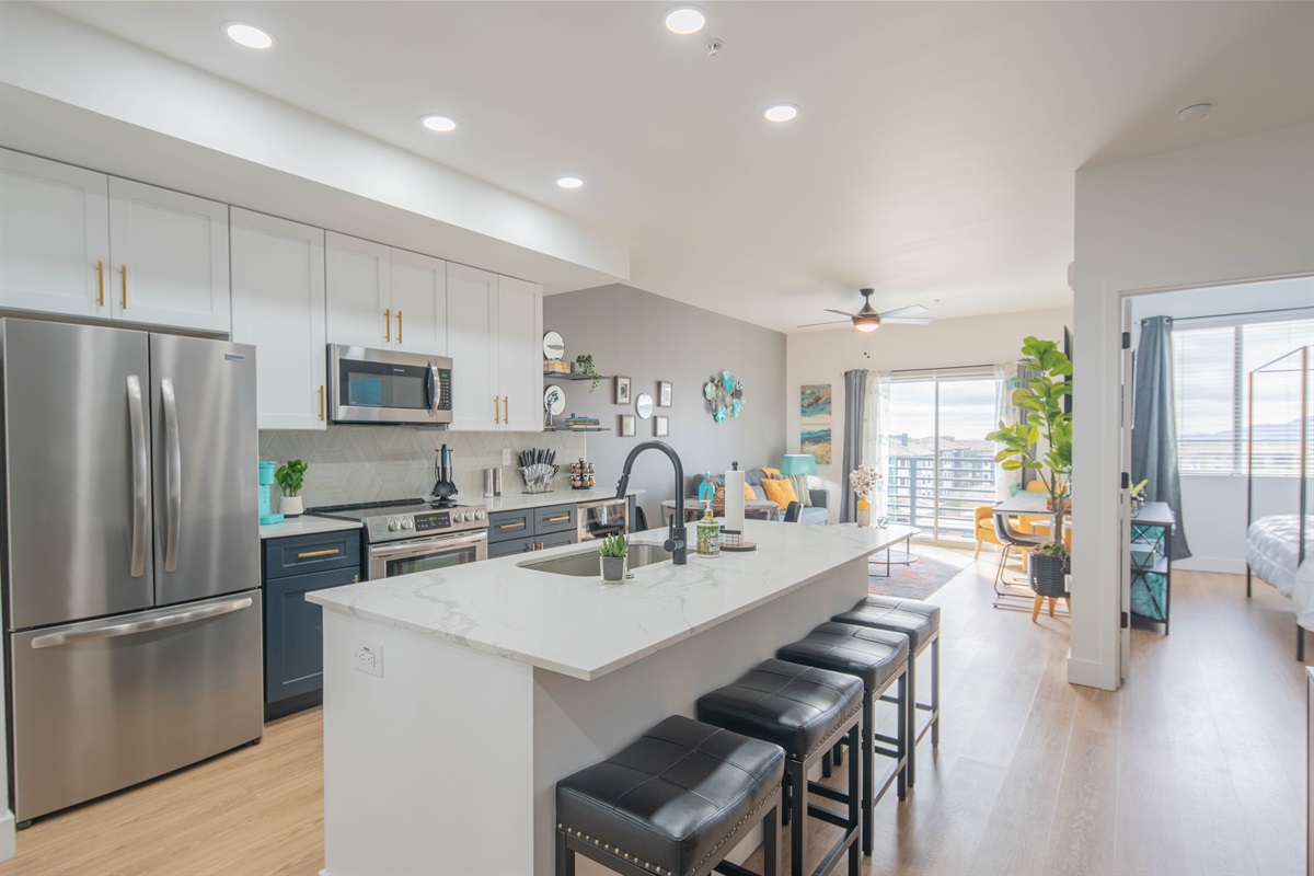 A spacious kitchen bathed in natural light, perfect for culinary adventures and gatherings with loved ones