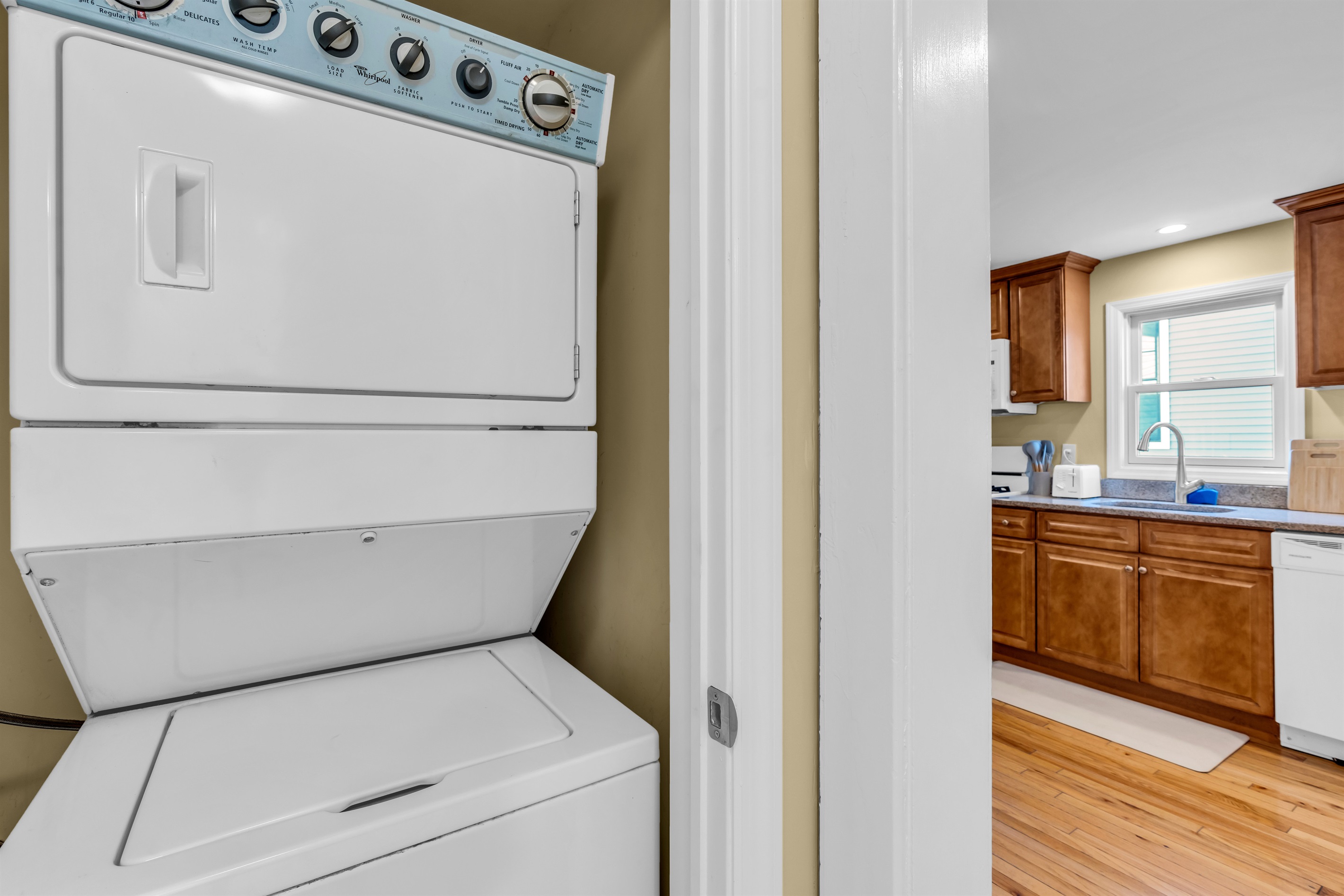 In-unit washer and dryer with laundry detergent provided to make the beach day clean up feel effortless!