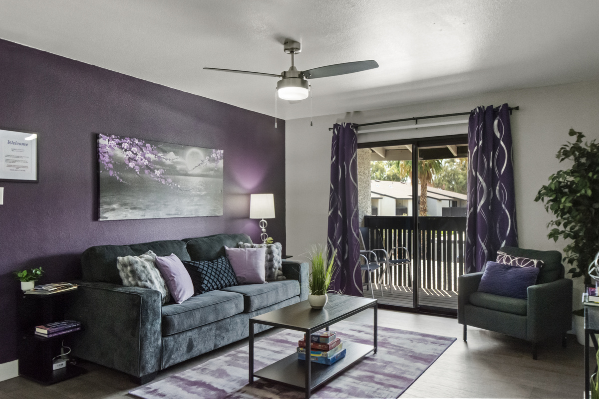A welcoming living room with cozy furnishings and thoughtful décor, creating a comfortable home-away-from-home.