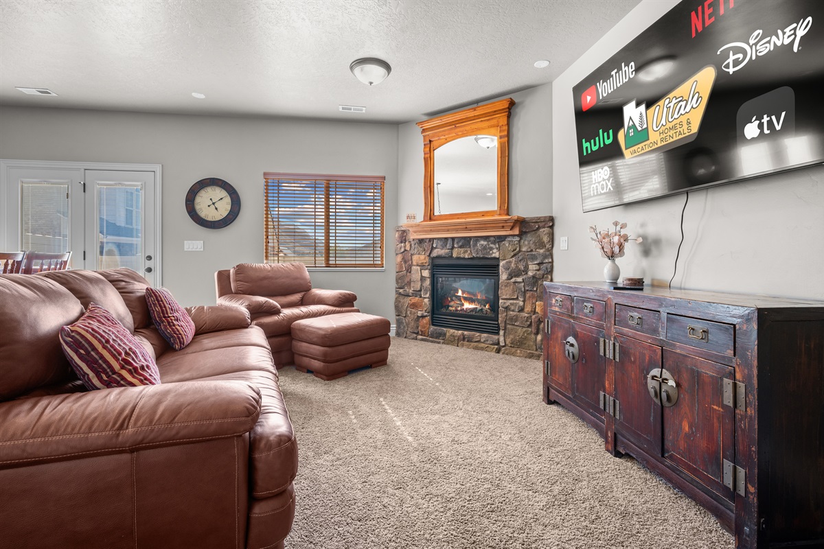 Sink into plush leather seating and unwind by the cozy fireplace after a day on the slopes