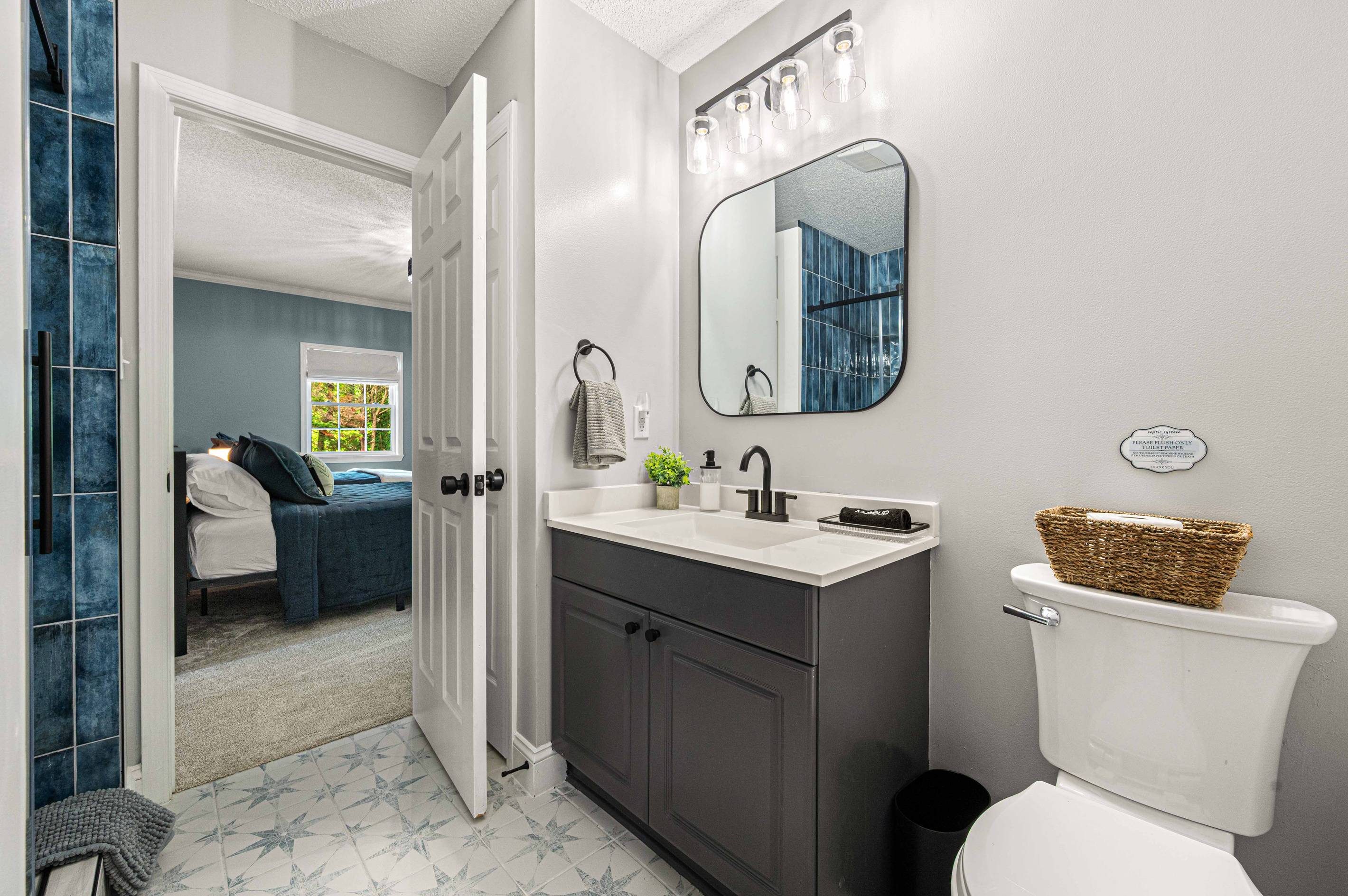 Bathroom Retreat: Elegant fixtures and a serene view create a refreshing escape post-adventure!