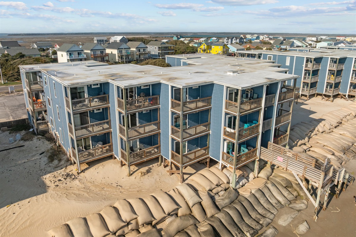 Rear aerial view highlighting private balconies facing the Atlantic
