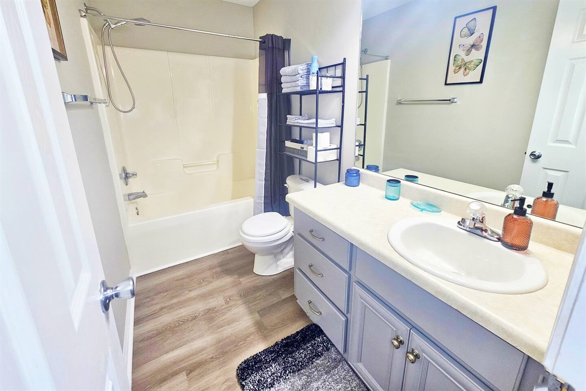 Full-sized bathroom located in the hall.  It contains all your necessities and a little extra. 