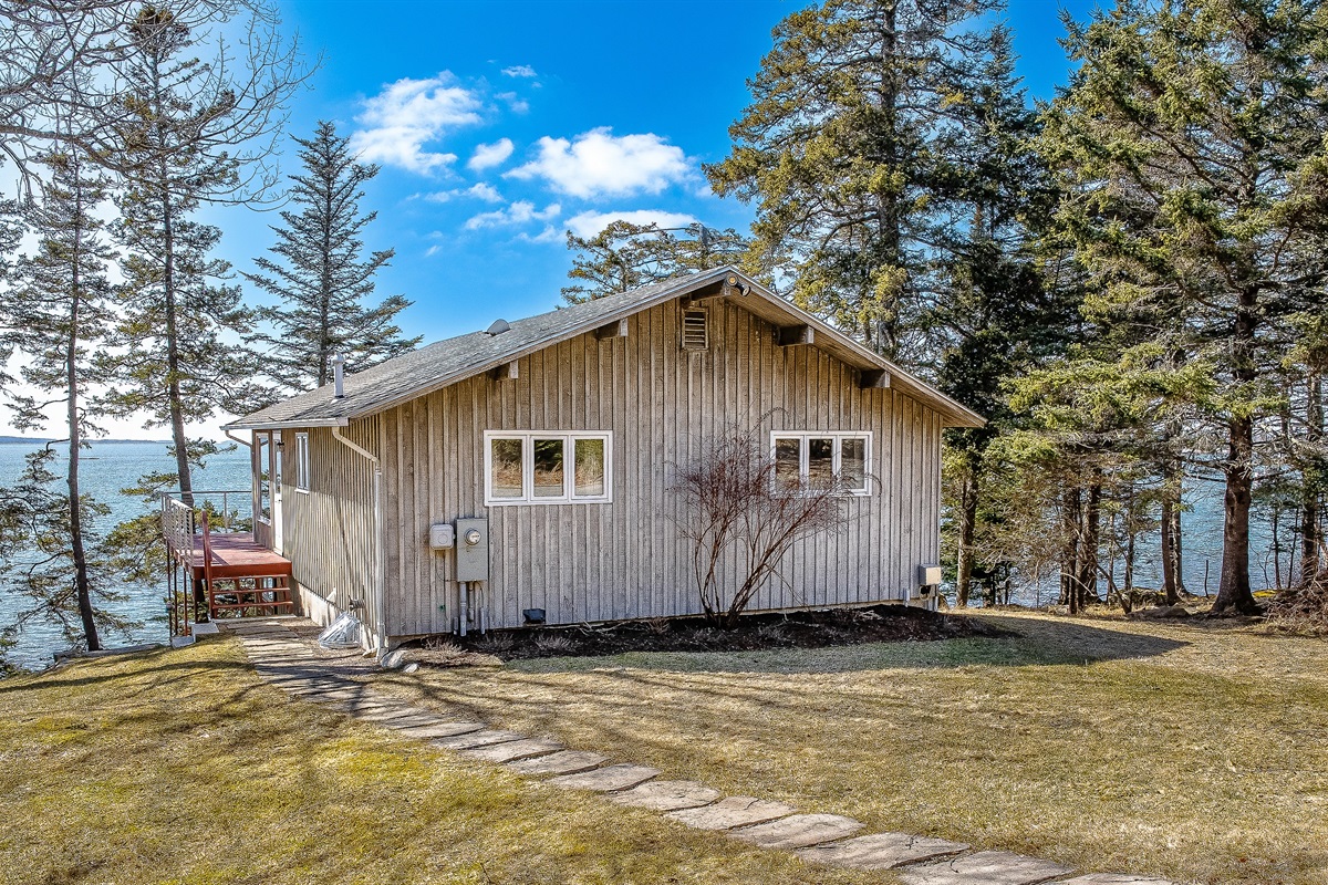 "Where the Pines Meet the Sea."
Our custom coastal home is nestled on a private, sun-drenched lot, offering an intimate connection to the Bass Harbor shoreline.