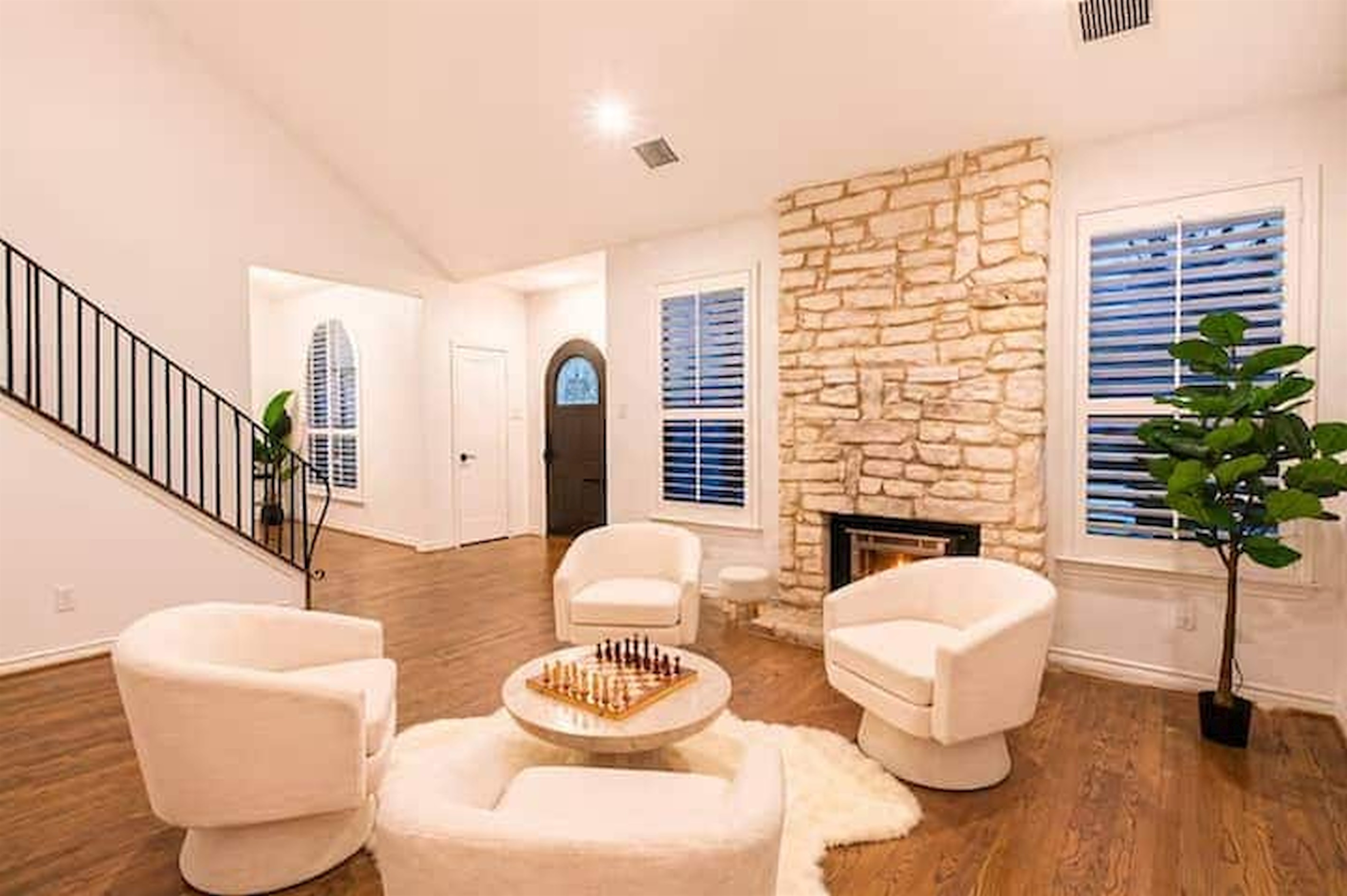 Bright, open living area with soaring ceilings and welcoming natural light